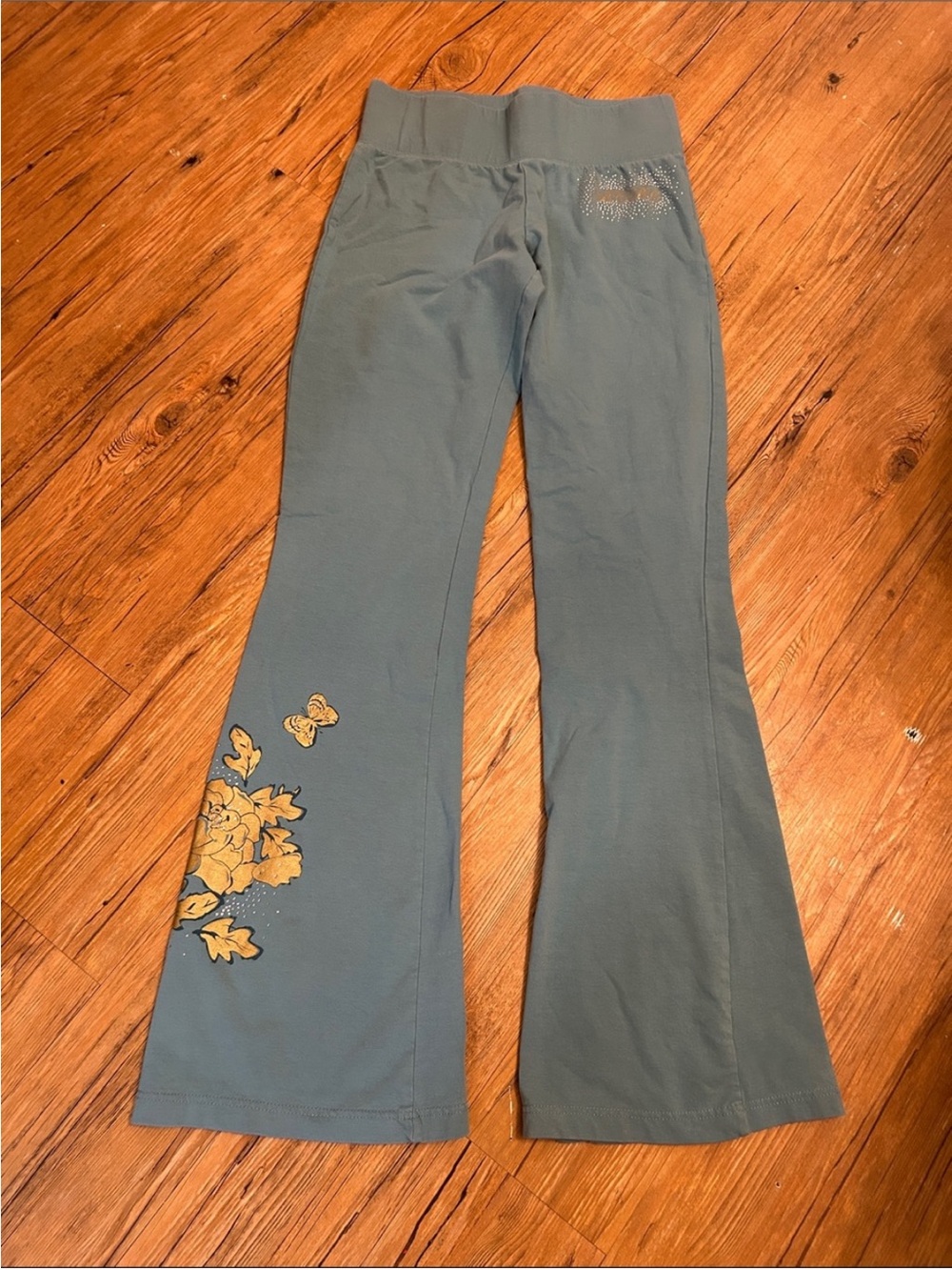 BCBGMaxAzria Teal Flared Leggings with Gold Floral Detail